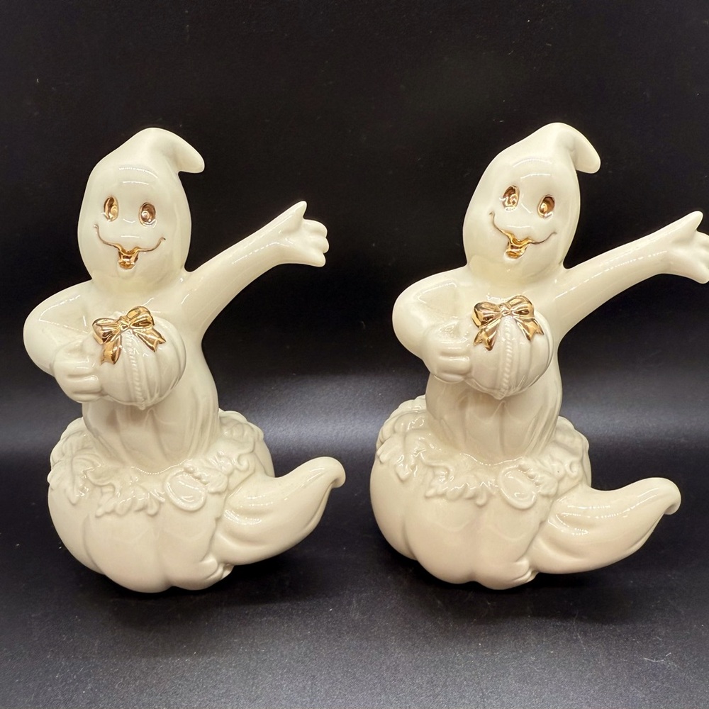 Pair of Lenox friendly ghosts popping out of a pumpkin. Perfect for Halloween.